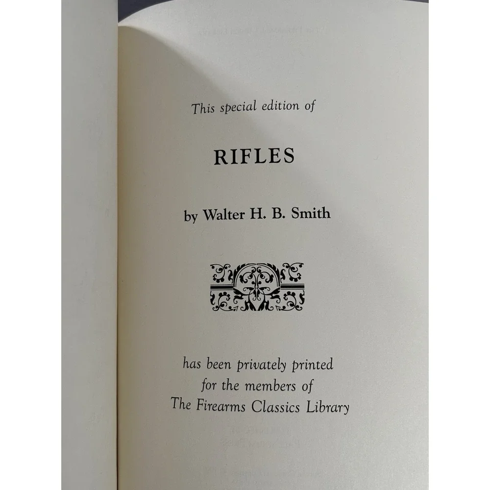 Pistols & Revolvers Vol I and Rifles Vol II Leather bound Books NRA